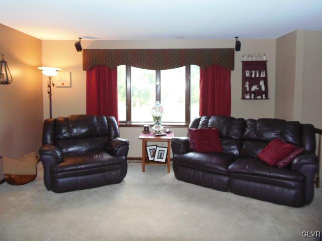 803 Copella Road Bath, PA 18014 - Photo 6 of 31 a living room with furniture and a large window