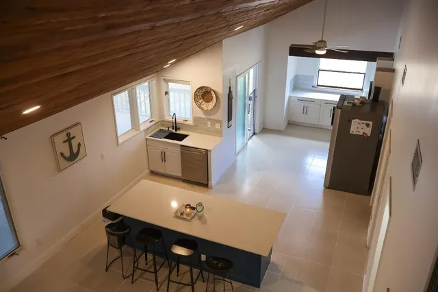 a view of kitchen and sink