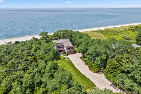 a view of a lake with a yard