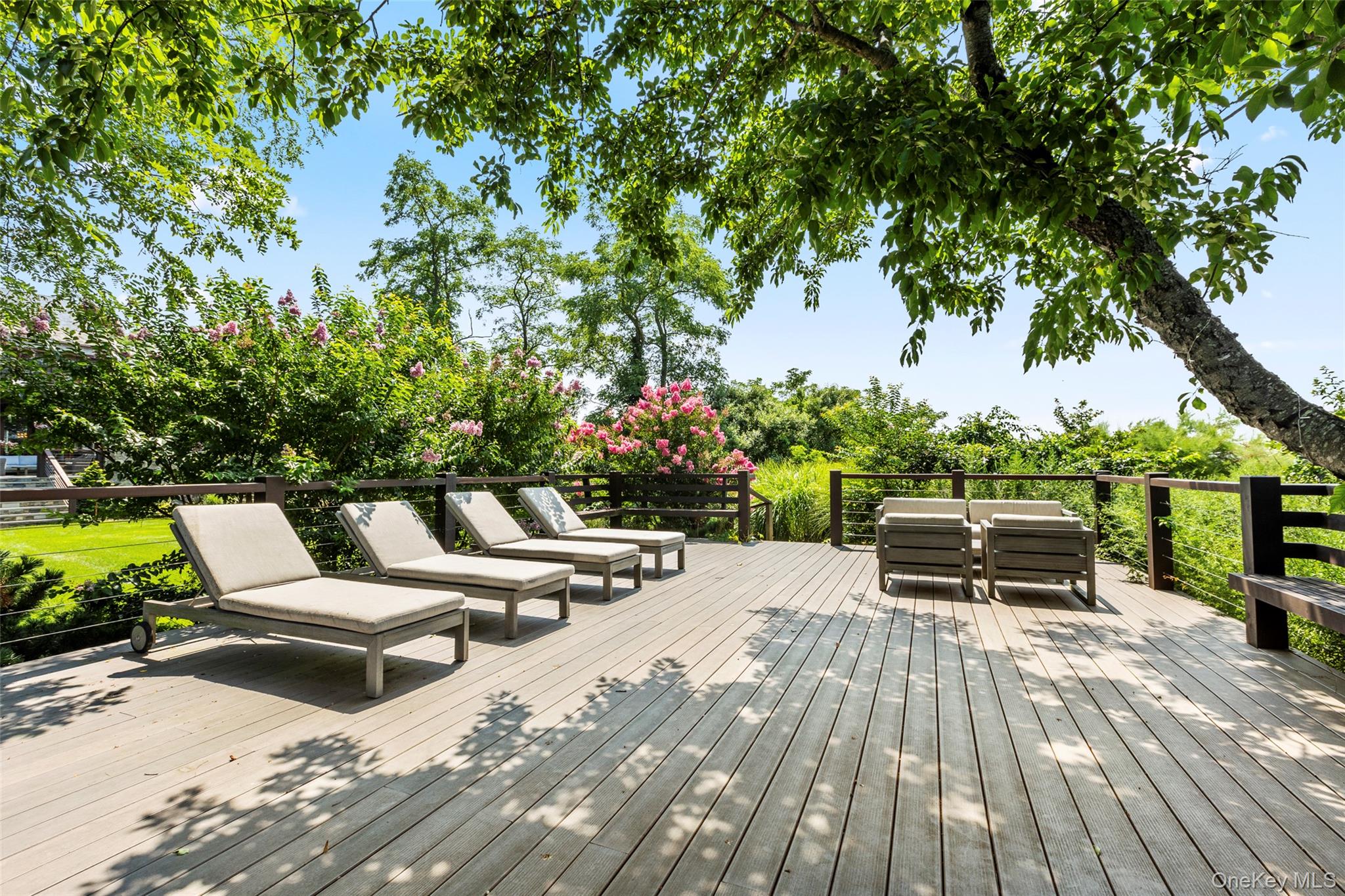 16 Old Field Woods Road Setauket, NY 11733 - Photo 19 of 37 a outdoor view with a sitting space