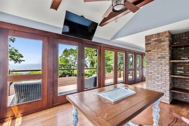 a view of a living room and dining room