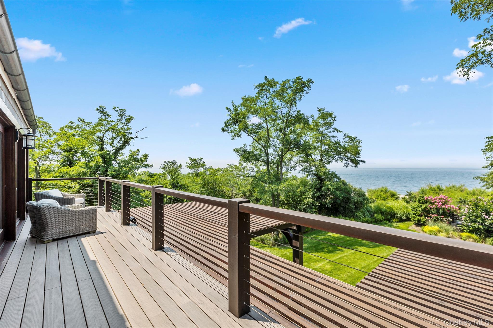 16 Old Field Woods Road Setauket, NY 11733 - Photo 24 of 37 a view of balcony with furniture