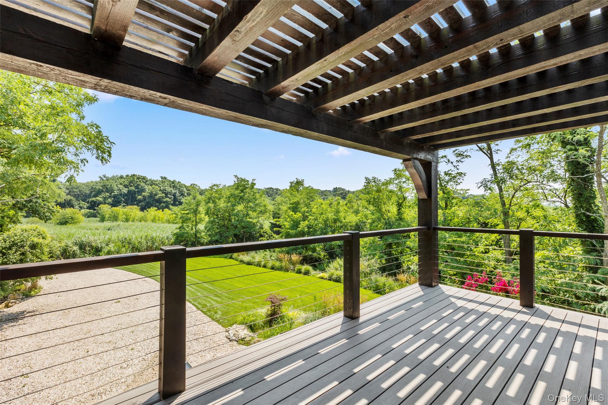 16 Old Field Woods Road Setauket, NY 11733 - Photo 32 of 37 a view of city from a balcony