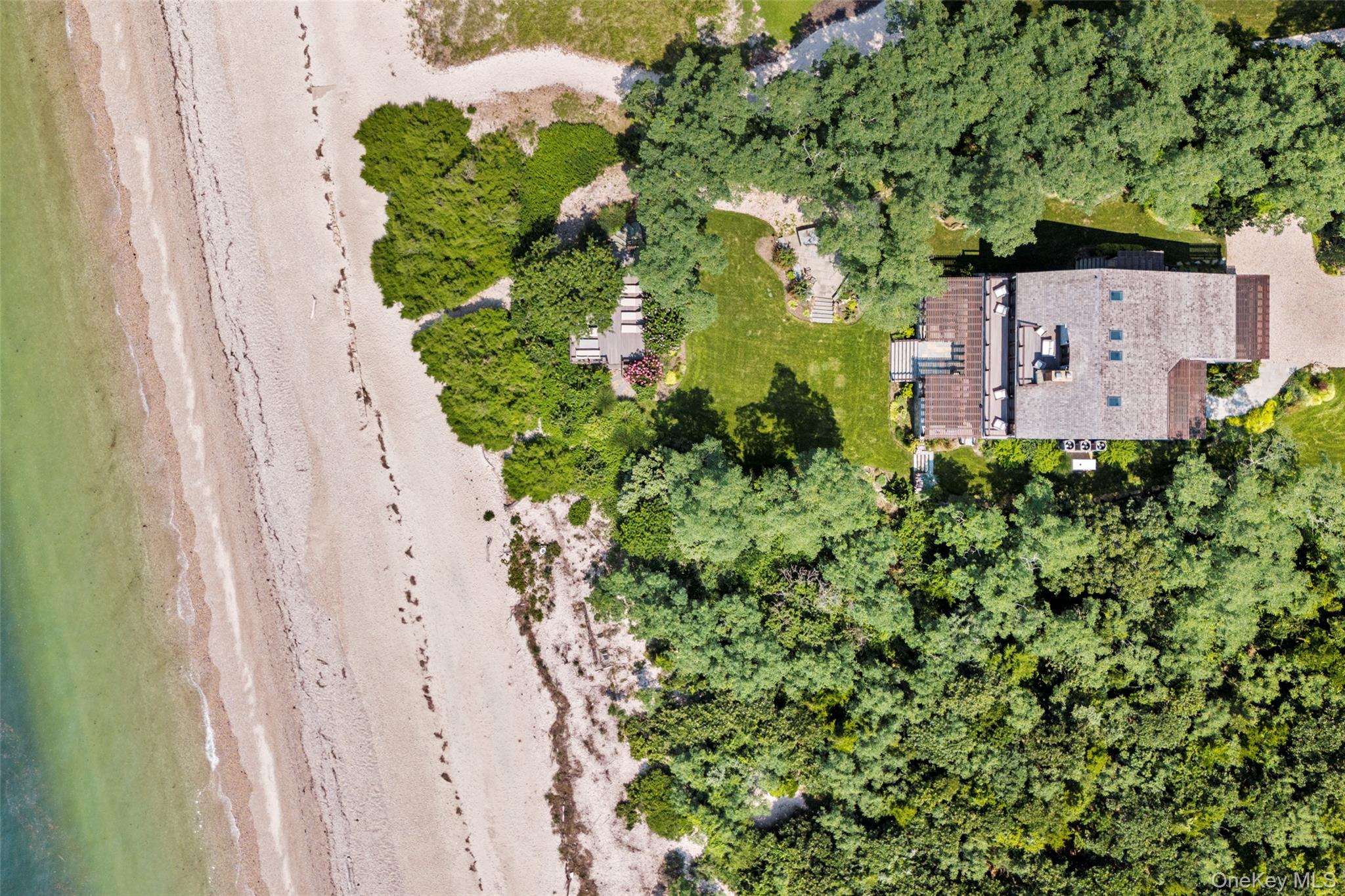 16 Old Field Woods Road Setauket, NY 11733 - Photo 35 of 37 an aerial view of a house with a yard