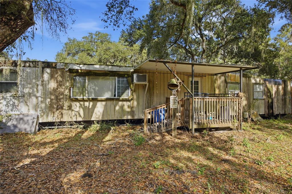12454 Browns Berry Road Dover, FL 33527 - Photo 14 of 17 a backyard of a house with lots of green space