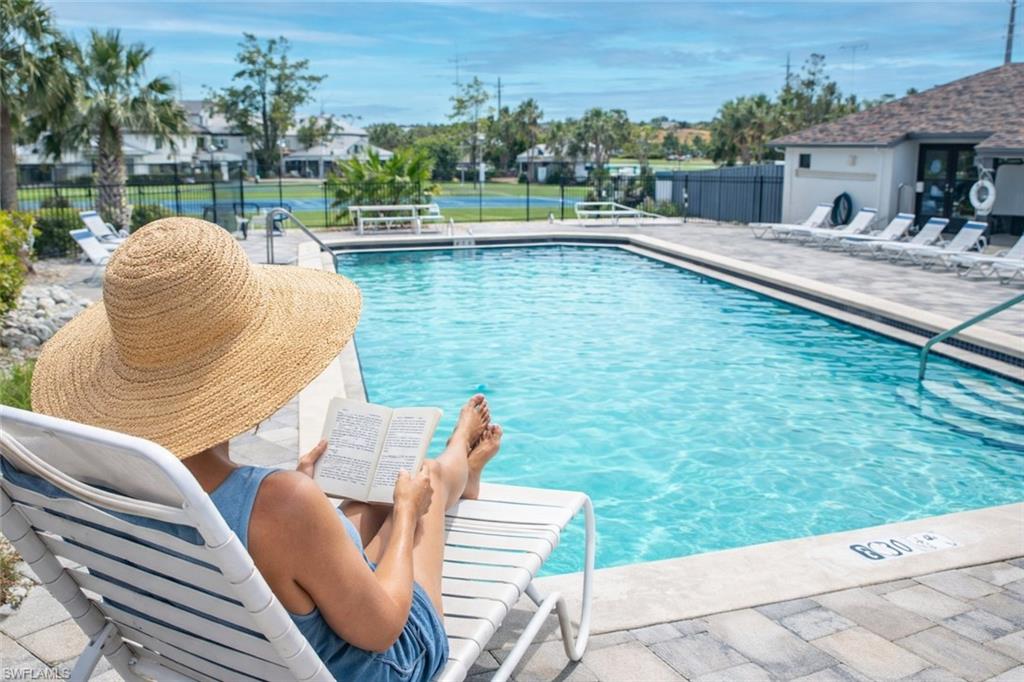 17455 Silver Fox Drive, Unit B Fort Myers, FL 33908 - Photo 4 of 19 Community pool featuring a patio