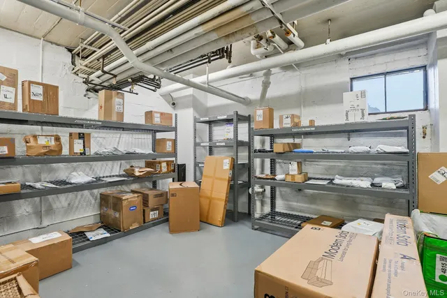 a room with stainless steel appliances granite countertop lots of counter top space