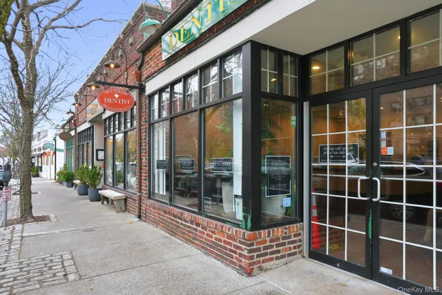 a view of a building with a glass door