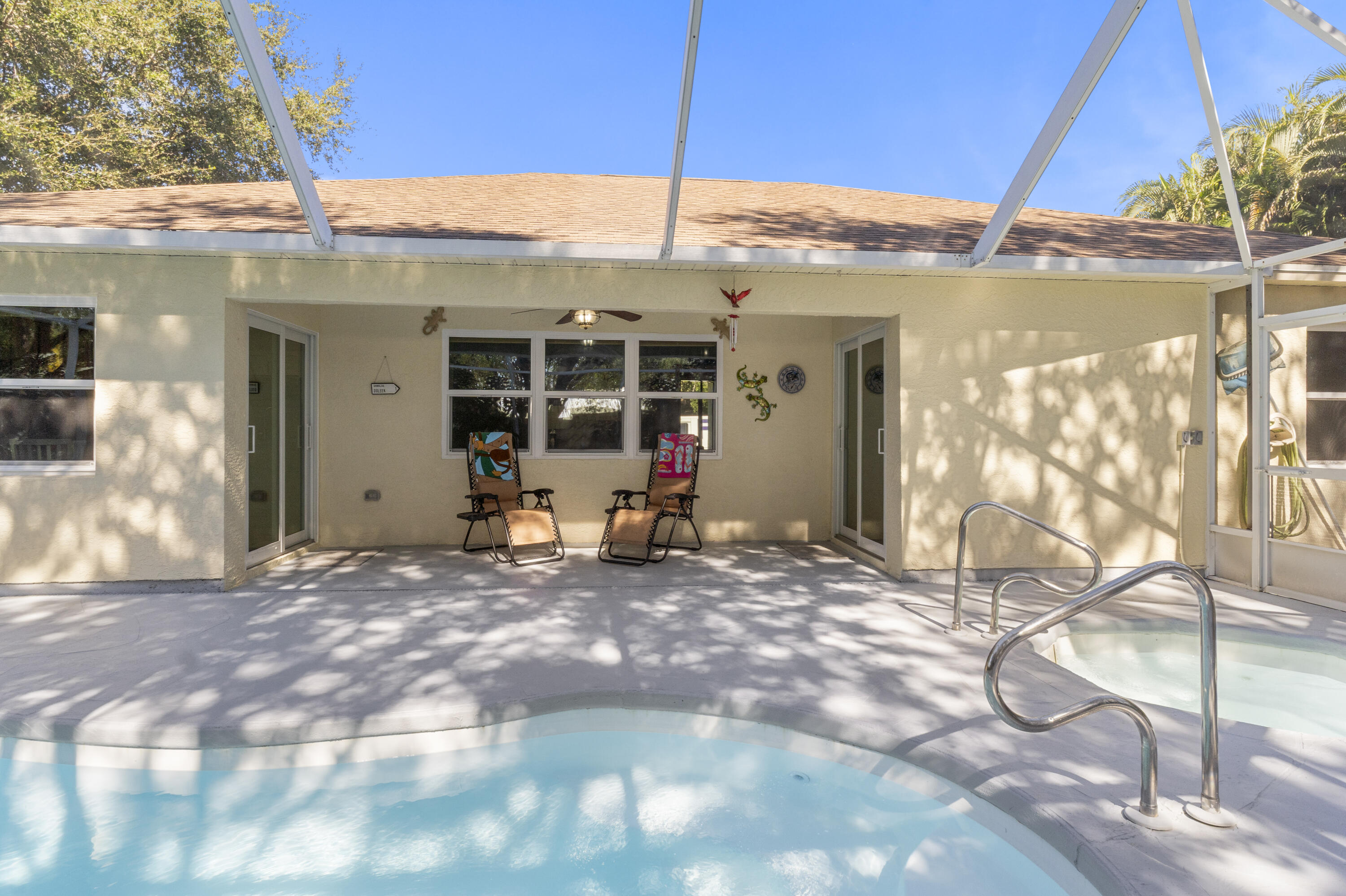 789 Vocelle Avenue Sebastian, FL 32958 - Photo 32 of 37 a view of a house with backyard porch and seating space