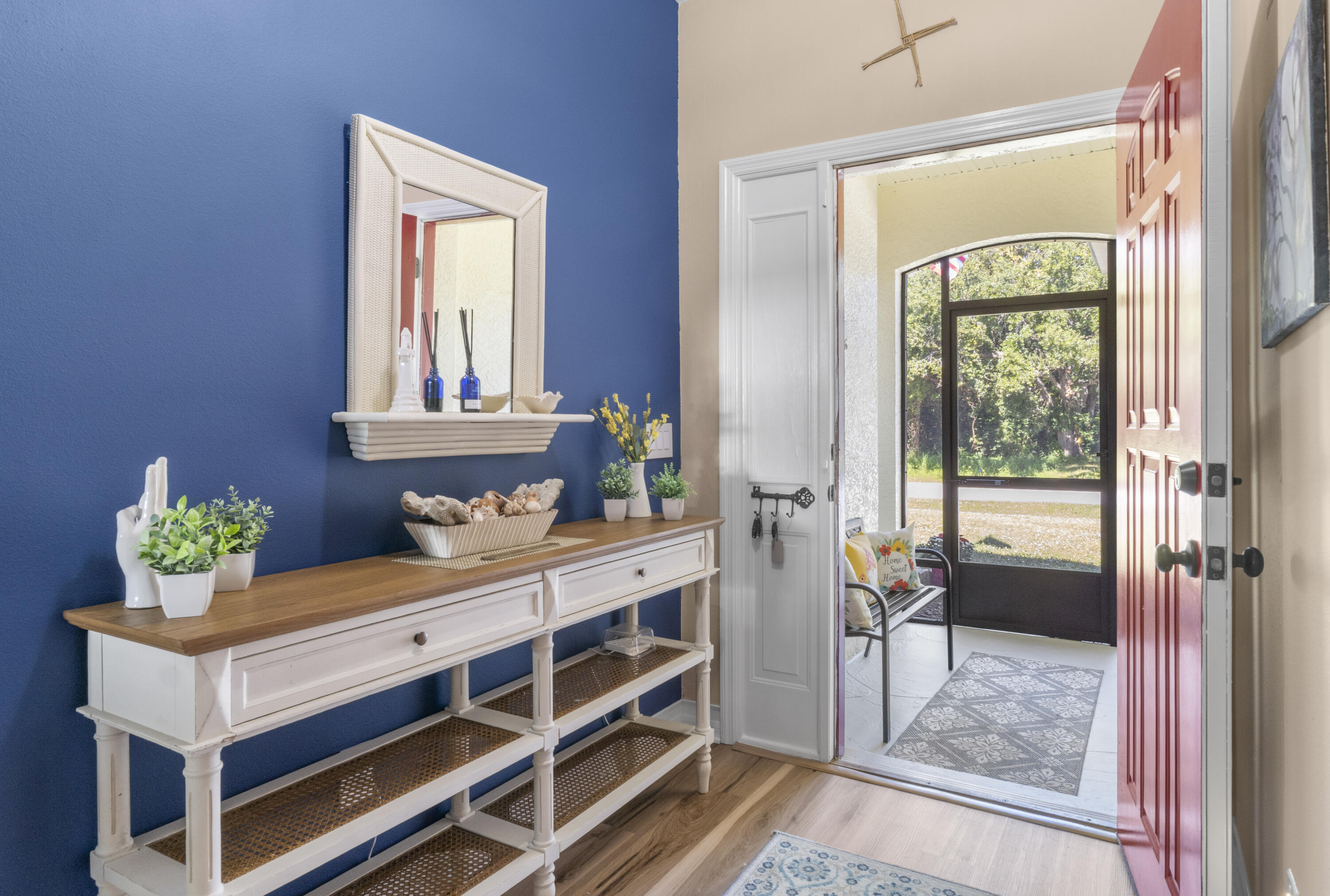 789 Vocelle Avenue Sebastian, FL 32958 - Photo 6 of 37 a bedroom with a bed table and window