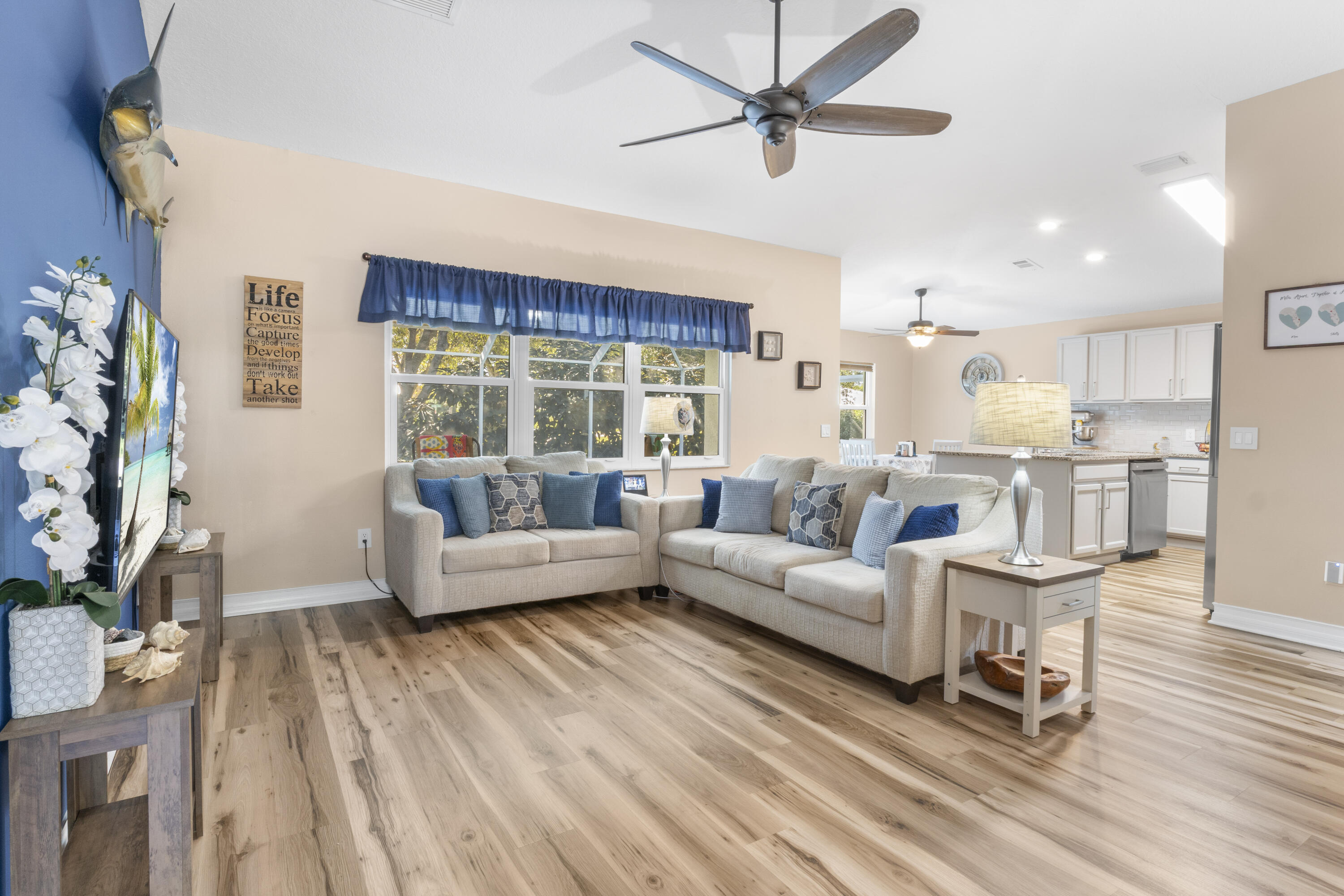 789 Vocelle Avenue Sebastian, FL 32958 - Photo 10 of 37 a living room with furniture and a large window