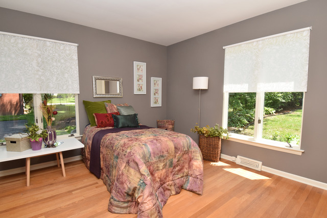 136 Fairway Lane Wheaton, IL 60189 - Photo 16 of 22 a bed sitting in a bedroom next to a window