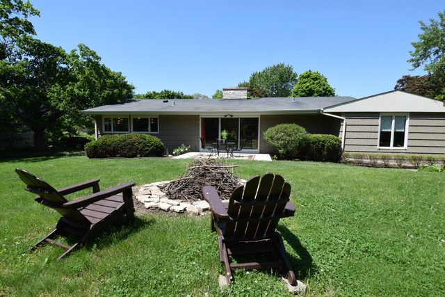 136 Fairway Lane Wheaton, IL 60189 - Photo 21 of 22 a view of a house with a yard chairs and a table