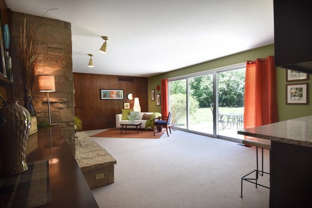 136 Fairway Lane Wheaton, IL 60189 - Photo 6 of 22 a view of a livingroom with furniture and a large window