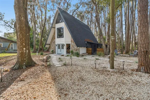 a view of house with a outdoor space