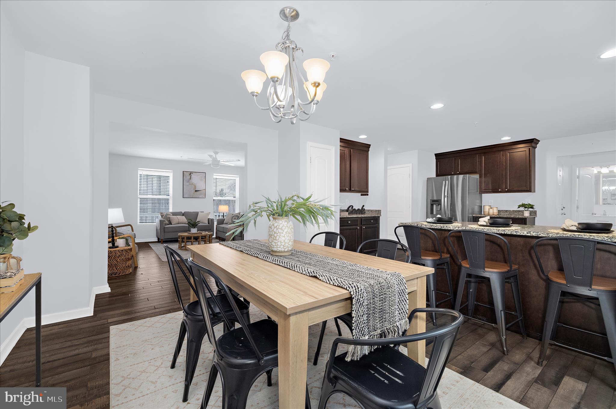 3009 Noahs Way Pasadena, MD 21122 - Photo 11 of 44 a view of a dining room with furniture and wooden floor