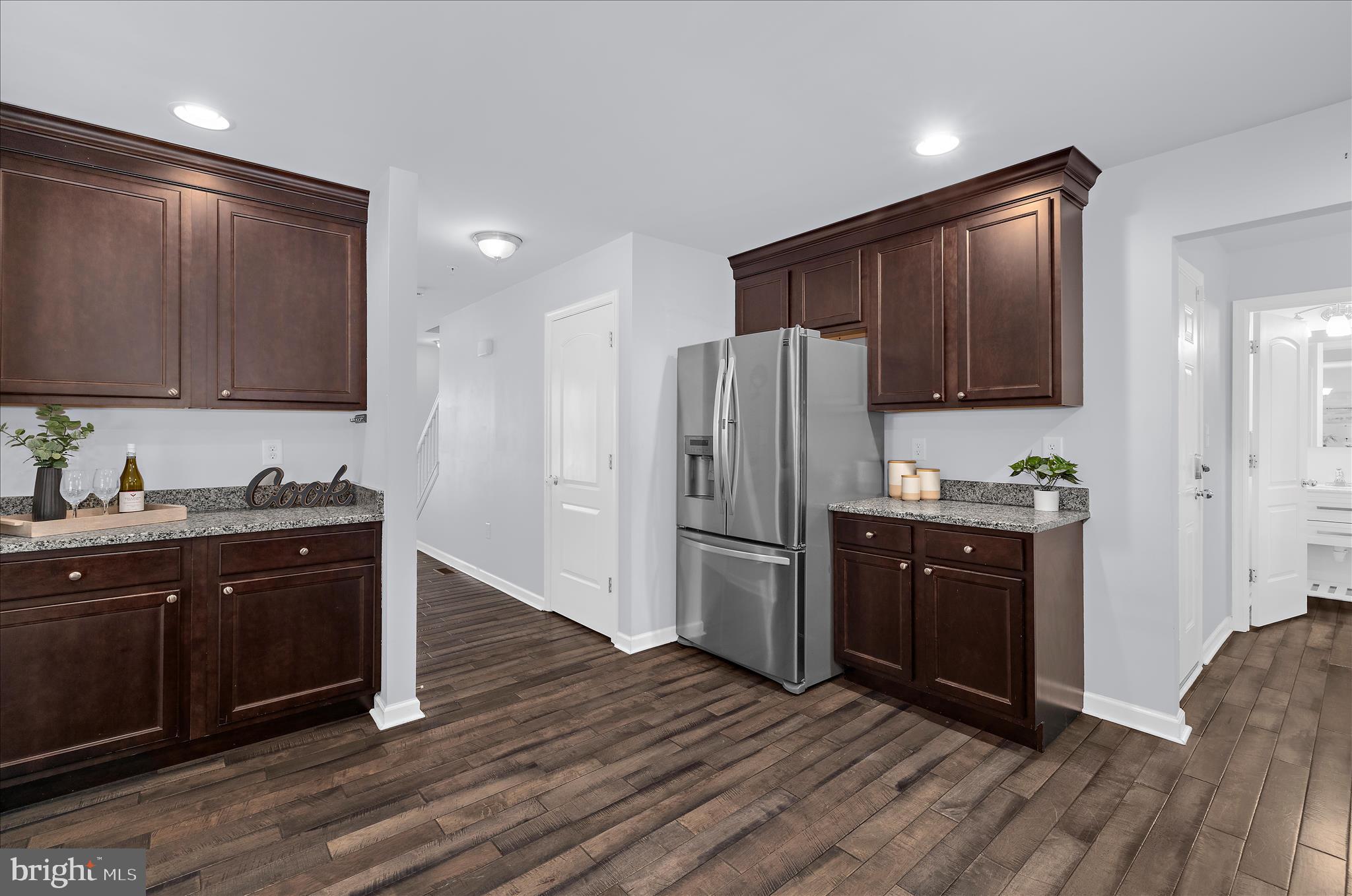 3009 Noahs Way Pasadena, MD 21122 - Photo 14 of 44 a kitchen with stainless steel appliances granite countertop a refrigerator stove and sink