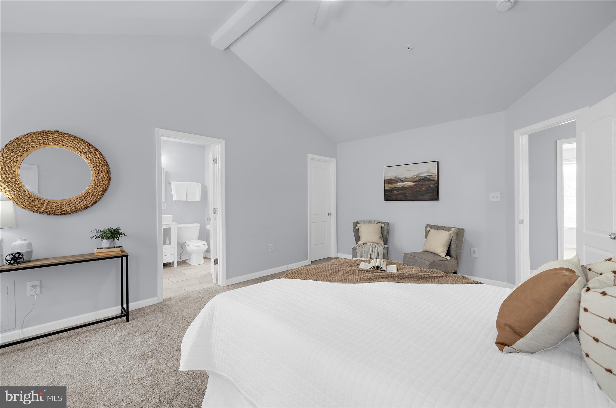 3009 Noahs Way Pasadena, MD 21122 - Photo 20 of 44 a bedroom with a bed and a chandelier