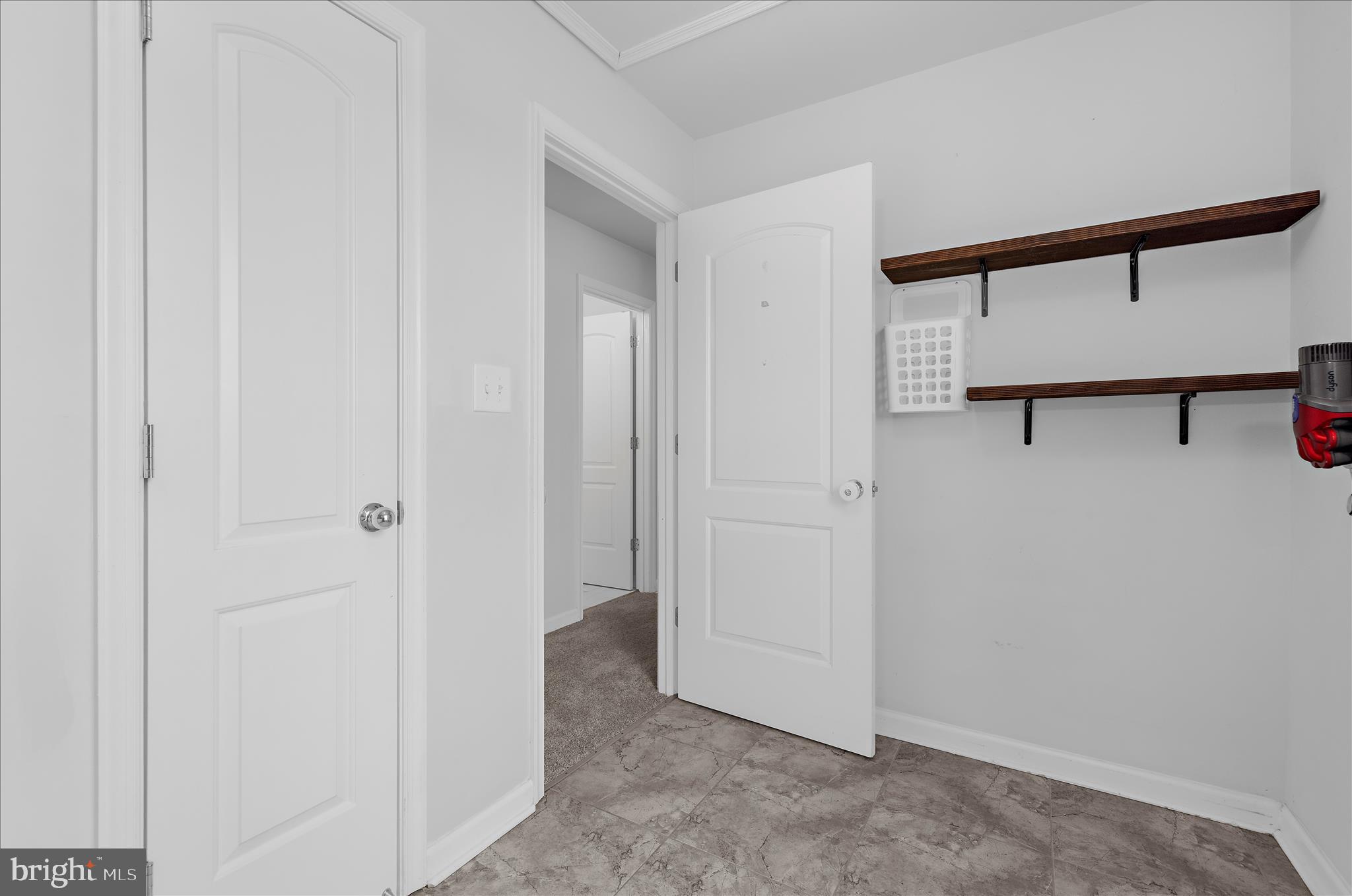 3009 Noahs Way Pasadena, MD 21122 - Photo 24 of 44 a view of a hallway with closet area