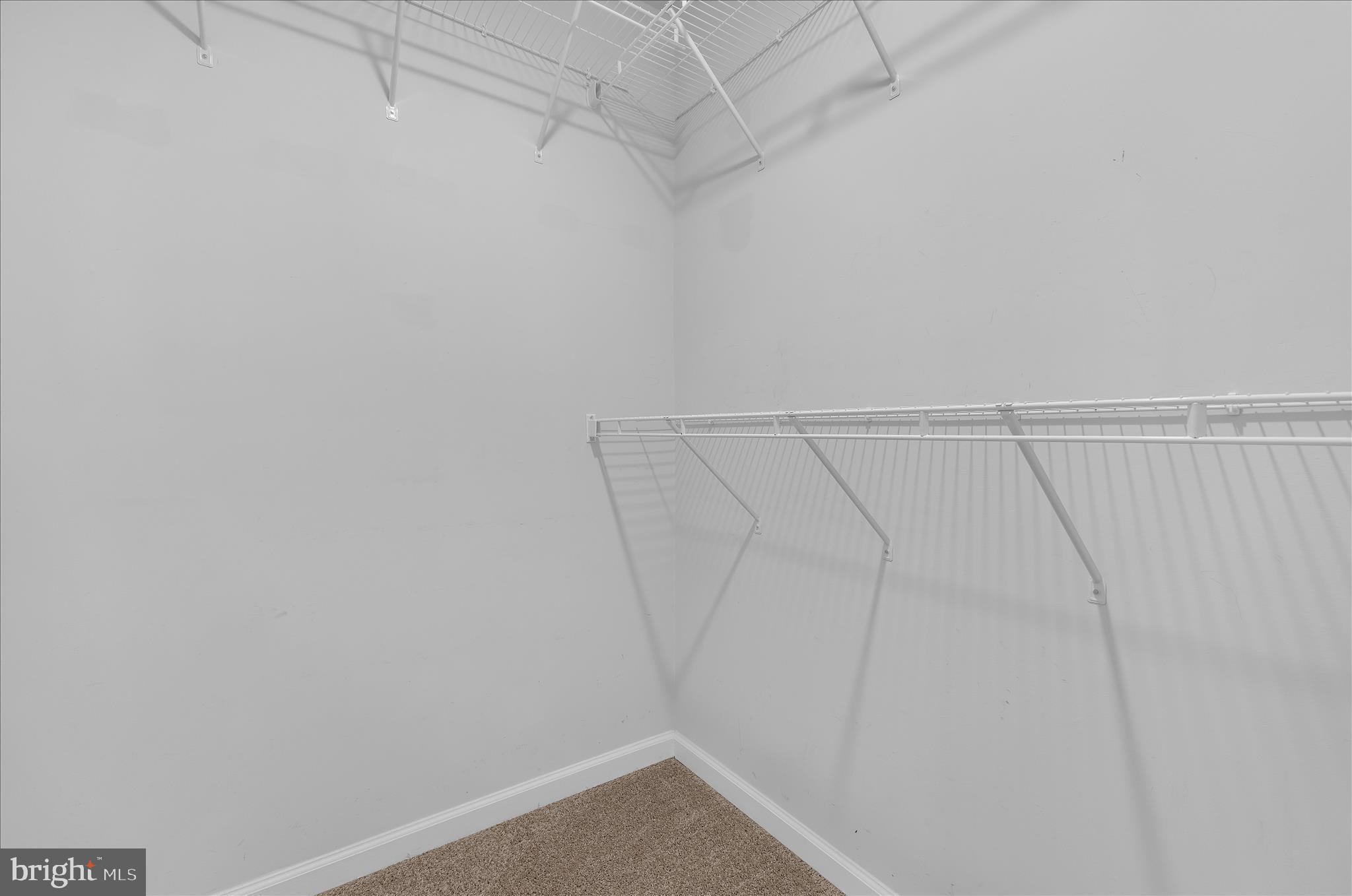 3009 Noahs Way Pasadena, MD 21122 - Photo 30 of 44 a view of a room with racks on the wall