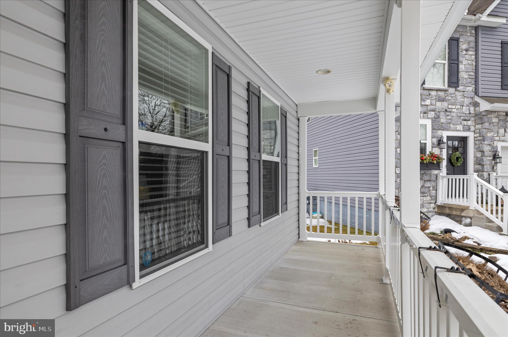 3009 Noahs Way Pasadena, MD 21122 - Photo 3 of 44 a view of a house with a balcony