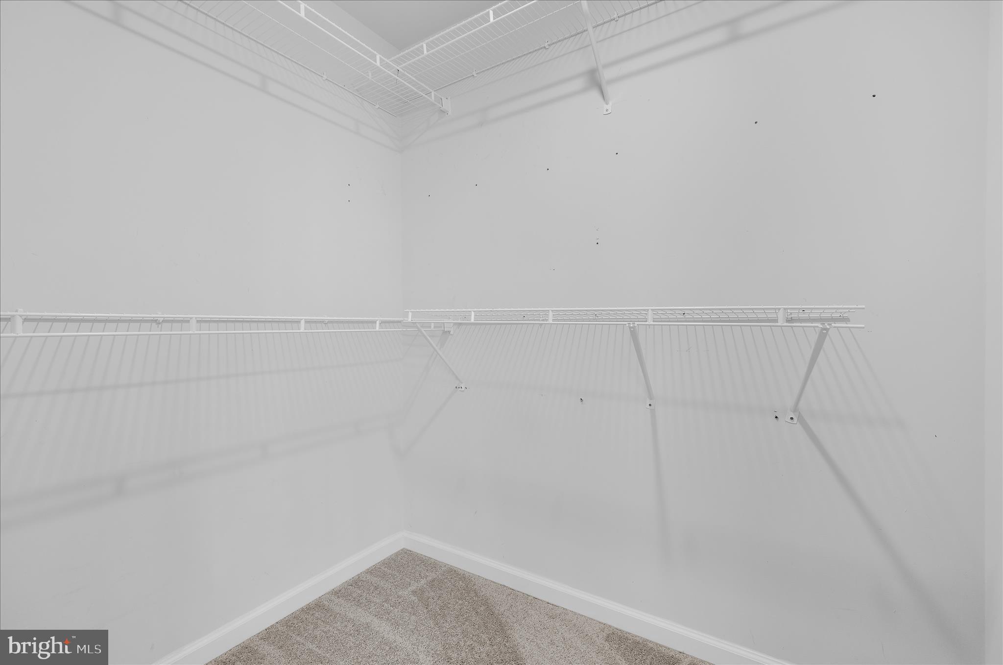 3009 Noahs Way Pasadena, MD 21122 - Photo 31 of 44 a view of a room with racks on the wall