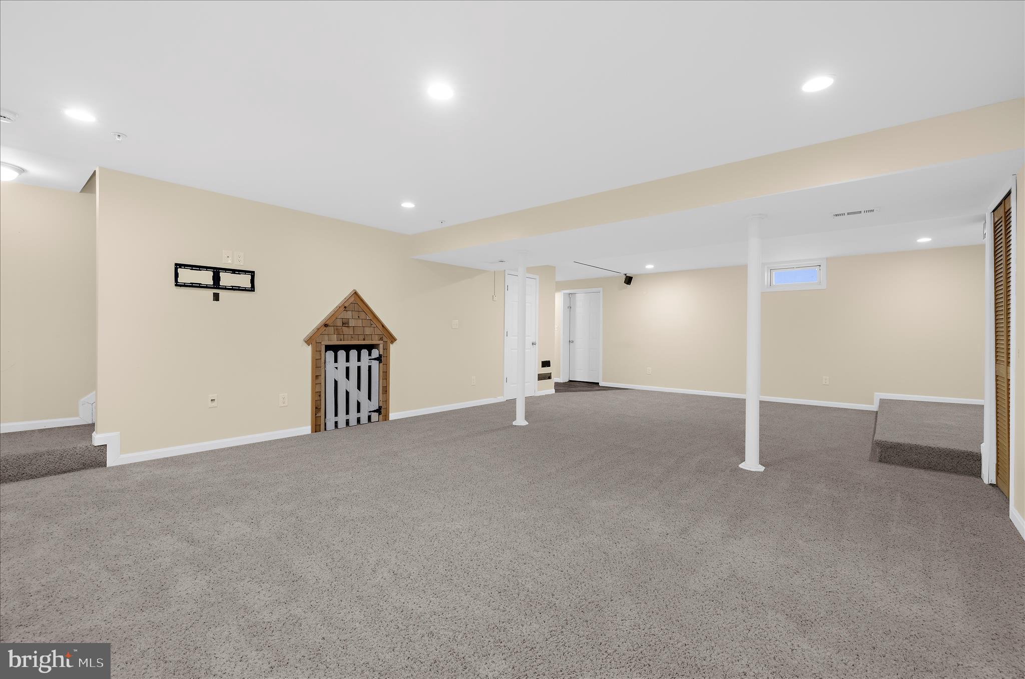 3009 Noahs Way Pasadena, MD 21122 - Photo 39 of 44 an empty room with entrance and stairs