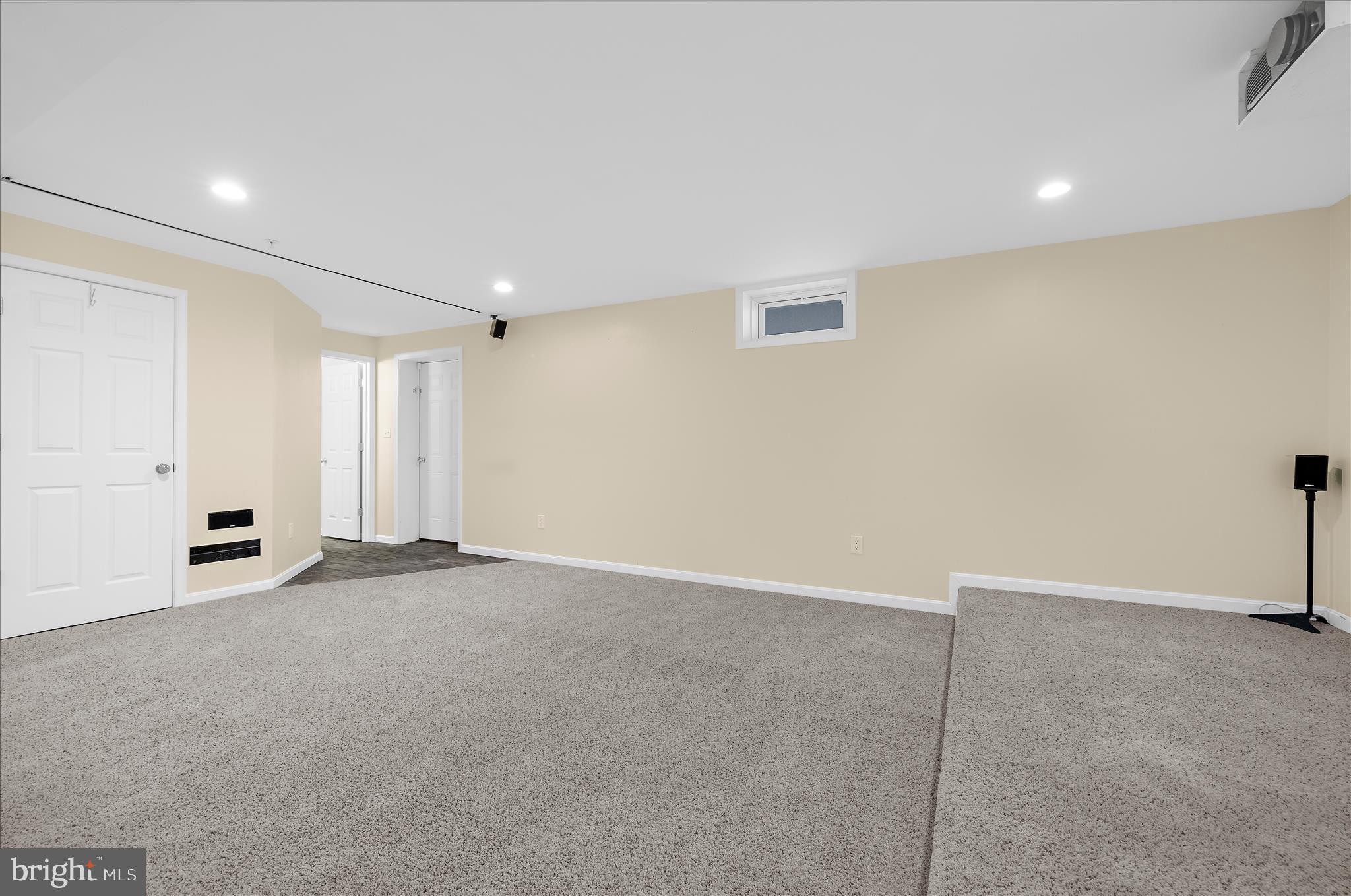 3009 Noahs Way Pasadena, MD 21122 - Photo 42 of 44 an empty room with a empty space and windows