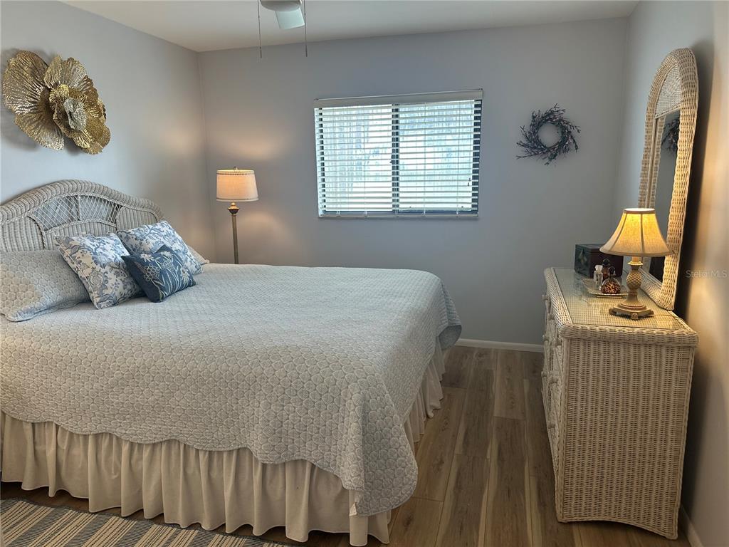 25225 Rampart Boulevard, Unit 105 Punta Gorda, FL 33983 - Photo 19 of 40 a bedroom with a bed and a window