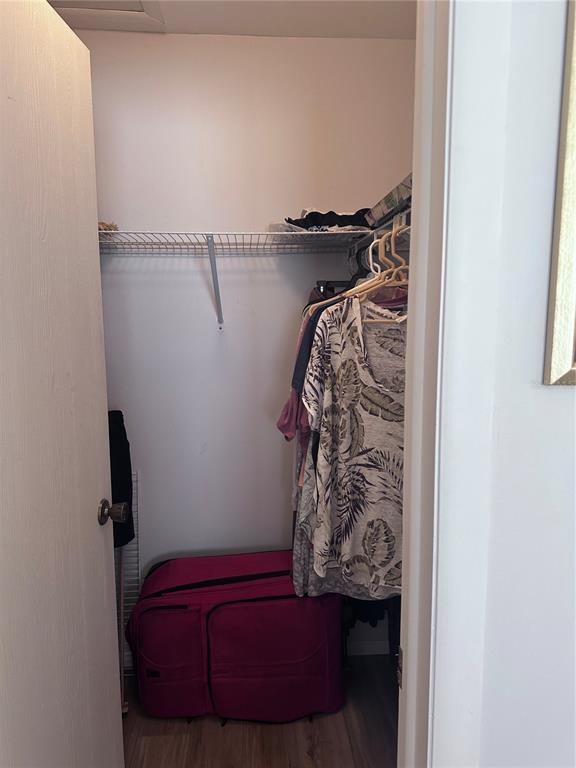 25225 Rampart Boulevard, Unit 105 Punta Gorda, FL 33983 - Photo 21 of 40 a view of walk in closet with clothes