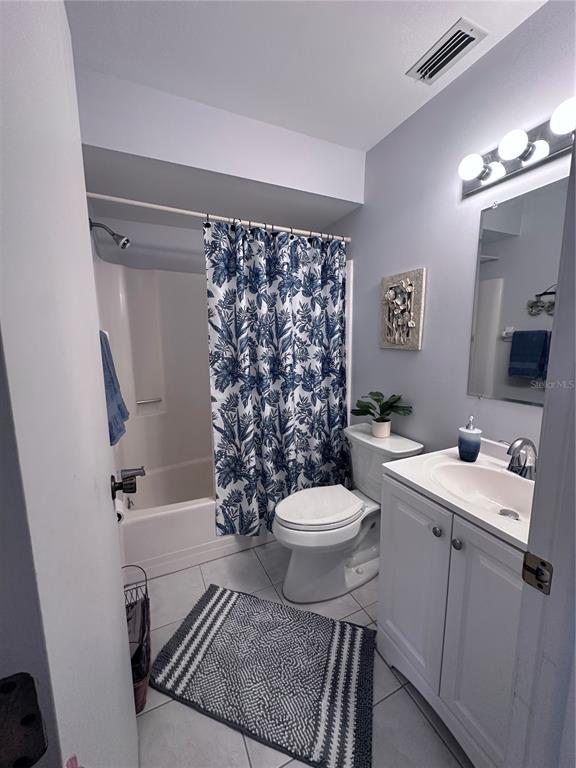 25225 Rampart Boulevard, Unit 105 Punta Gorda, FL 33983 - Photo 23 of 40 a bathroom with a sink toilet and shower