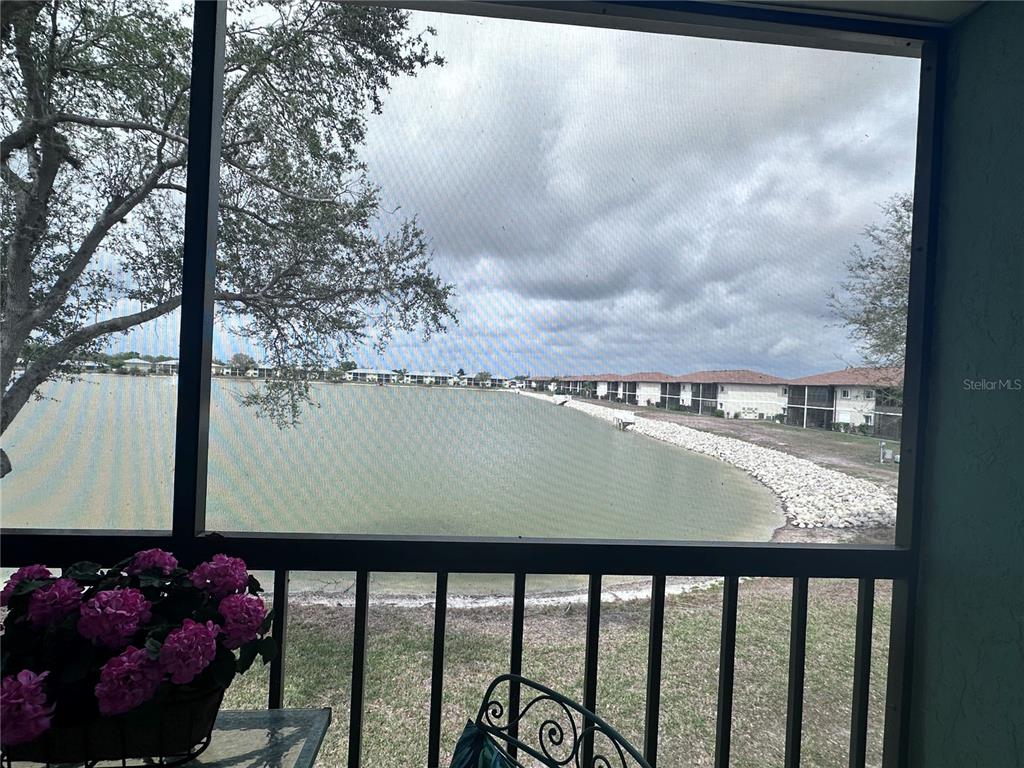 25225 Rampart Boulevard, Unit 105 Punta Gorda, FL 33983 - Photo 26 of 40 a view of a balcony with an outdoor space