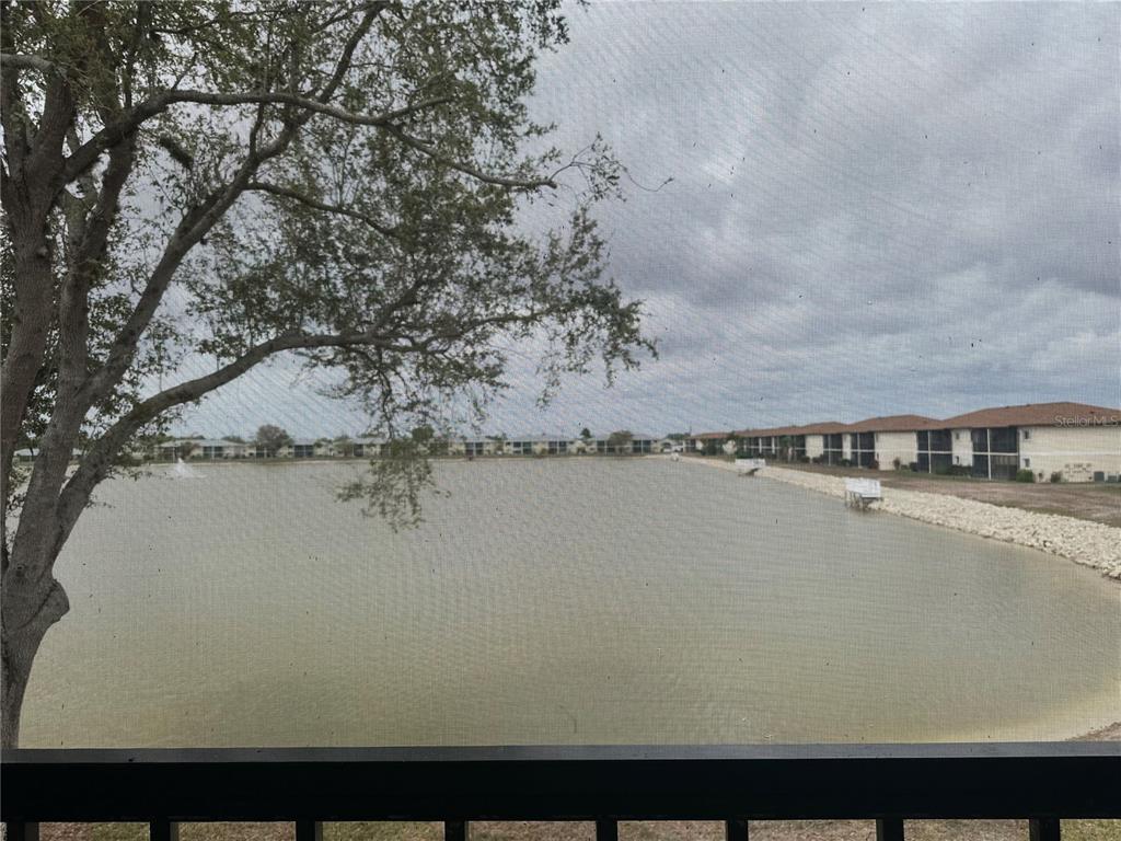 25225 Rampart Boulevard, Unit 105 Punta Gorda, FL 33983 - Photo 28 of 40 a view of a lake