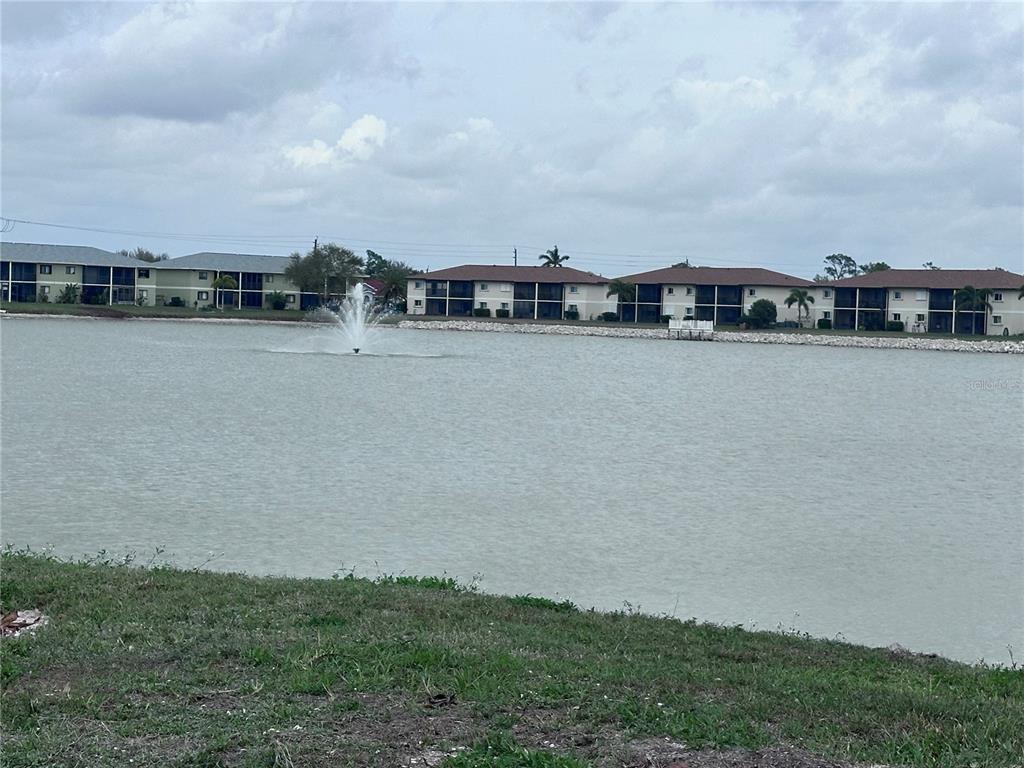 25225 Rampart Boulevard, Unit 105 Punta Gorda, FL 33983 - Photo 29 of 40 a view of building with river in front of it