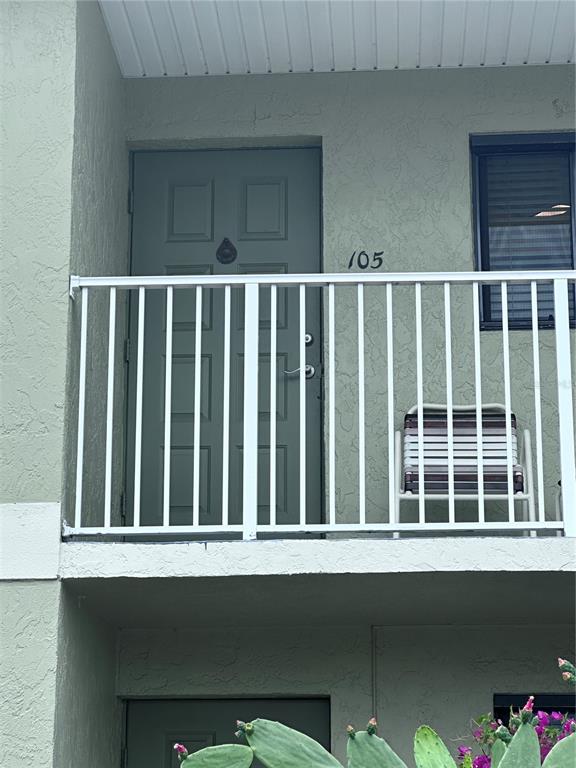 25225 Rampart Boulevard, Unit 105 Punta Gorda, FL 33983 - Photo 3 of 40 a view of wooden fence