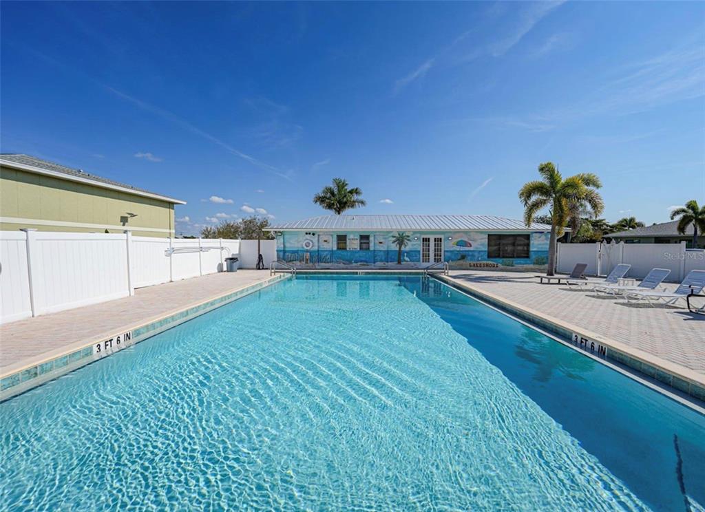 25225 Rampart Boulevard, Unit 105 Punta Gorda, FL 33983 - Photo 32 of 40 a view of a living room and kitchen