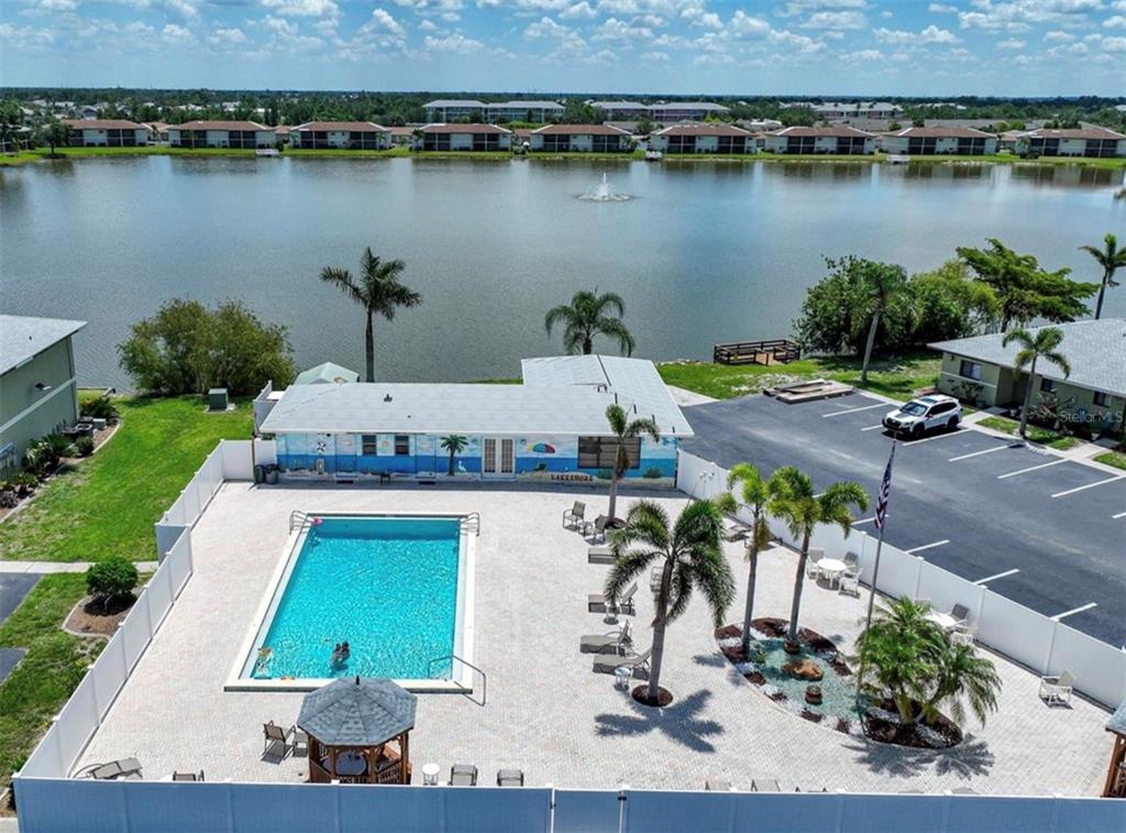25225 Rampart Boulevard, Unit 105 Punta Gorda, FL 33983 - Photo 34 of 40 an aerial view of a house with outdoor space and lake view