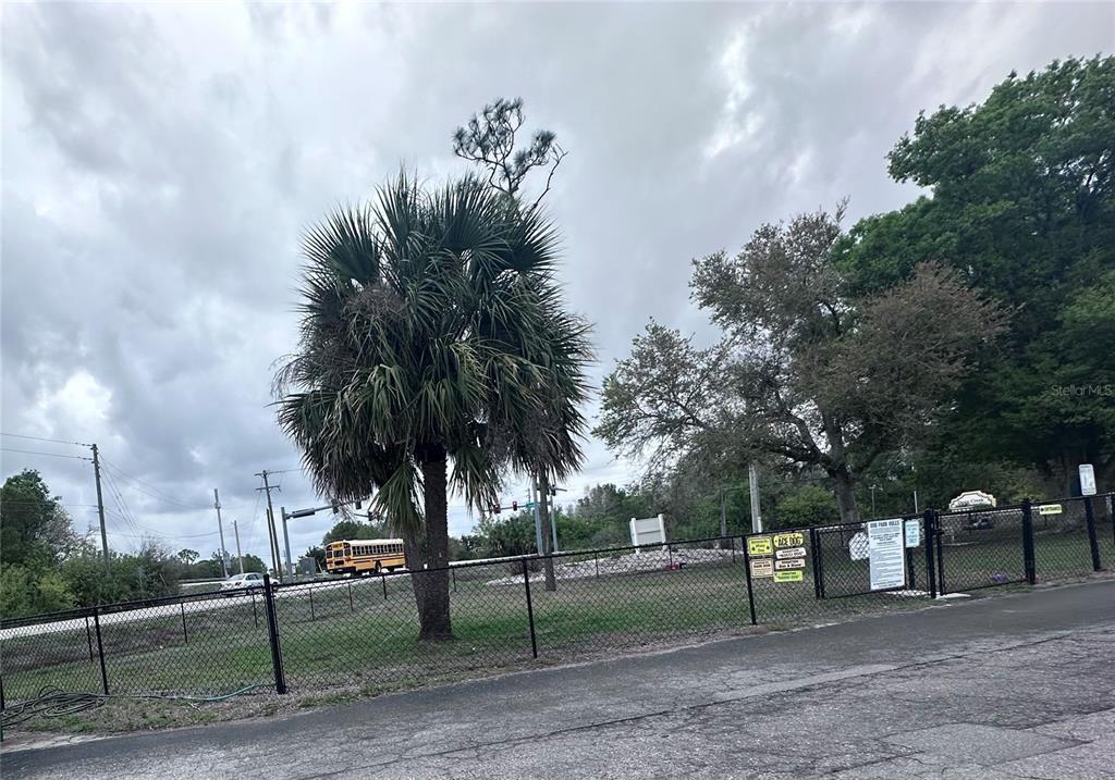 25225 Rampart Boulevard, Unit 105 Punta Gorda, FL 33983 - Photo 39 of 40 a view of a park with swings and slides