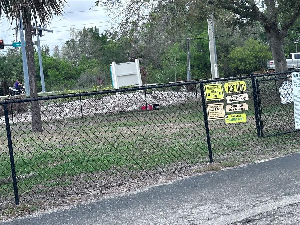25225 Rampart Boulevard, Unit 105 Punta Gorda, FL 33983 - Photo 40 of 40 a view of a park with iron fence