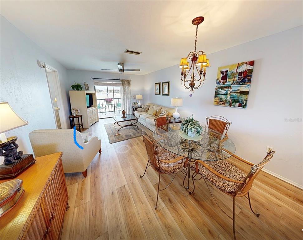 25225 Rampart Boulevard, Unit 105 Punta Gorda, FL 33983 - Photo 7 of 40 a living room with furniture