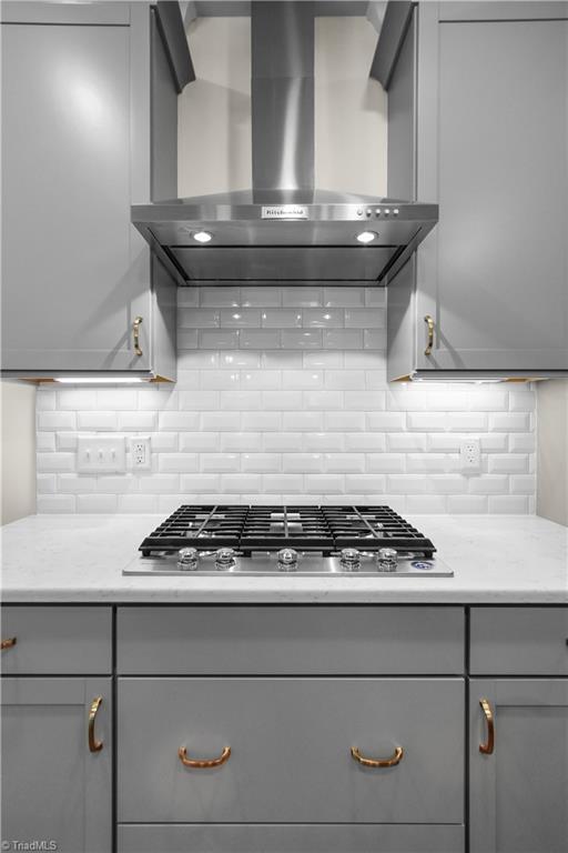 2071 Spring Wind Road Pfafftown, NC 27040 - Photo 12 of 35 Gas cooktop and vent hood