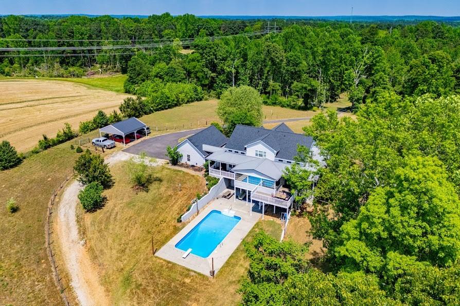 575 Liberty Church Road Carrollton, GA 30116 - Photo 60 of 95 an aerial view of a house with yard swimming pool and outdoor seating