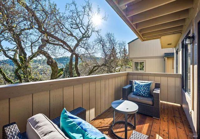 a view of a porch with furniture