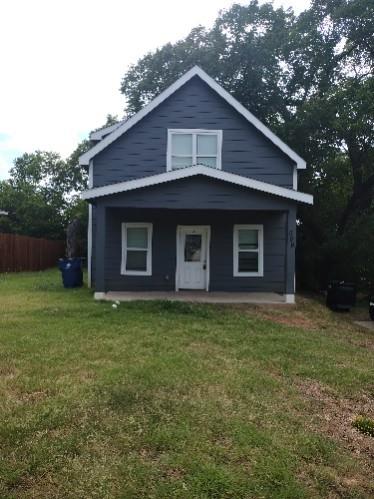 809 South Travis Avenue Denison, TX 75021 - Photo 1 of 13