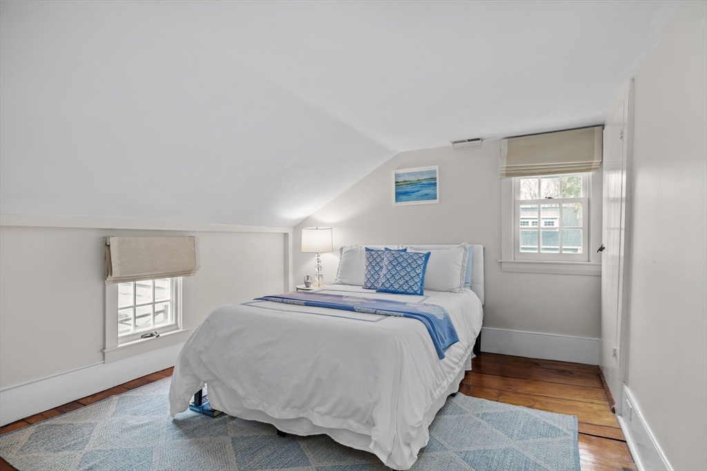 173 Holt Road Andover, MA 01810 - Photo 23 of 33 a bedroom with a bed and a window