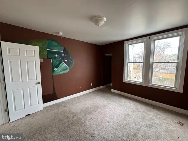 an empty room with windows