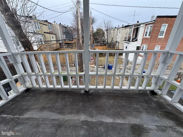a view of street from balcony