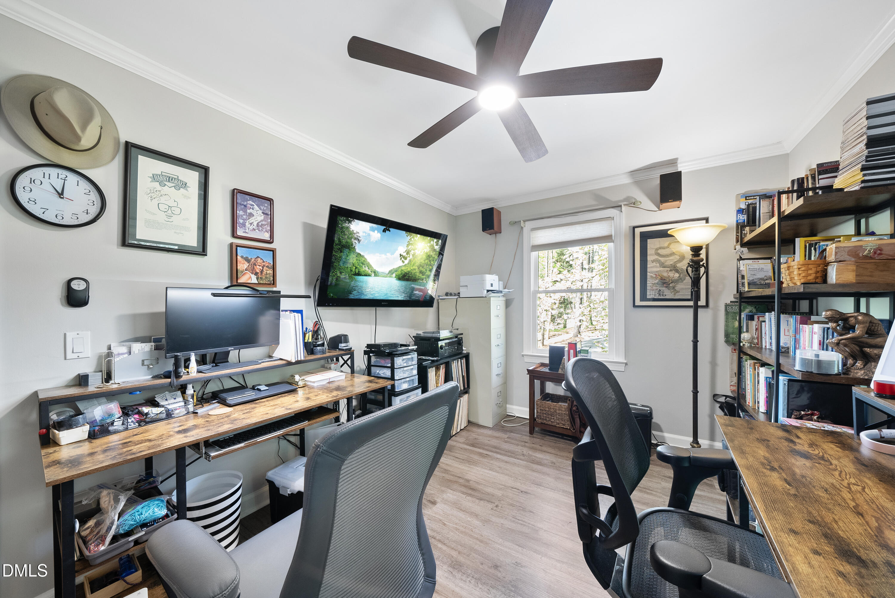 6200 Splitrock Trail Apex, NC 27539 - Photo 25 of 64 a work room with furniture and a flat screen tv