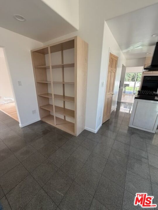 3900 Castlerock Road Malibu, CA 90265 - Photo 26 of 52 a view of walk in closet with empty racks