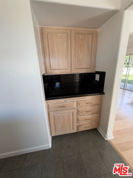 3900 Castlerock Road Malibu, CA 90265 - Photo 38 of 52 a bathroom with a sink a mirror and a shower